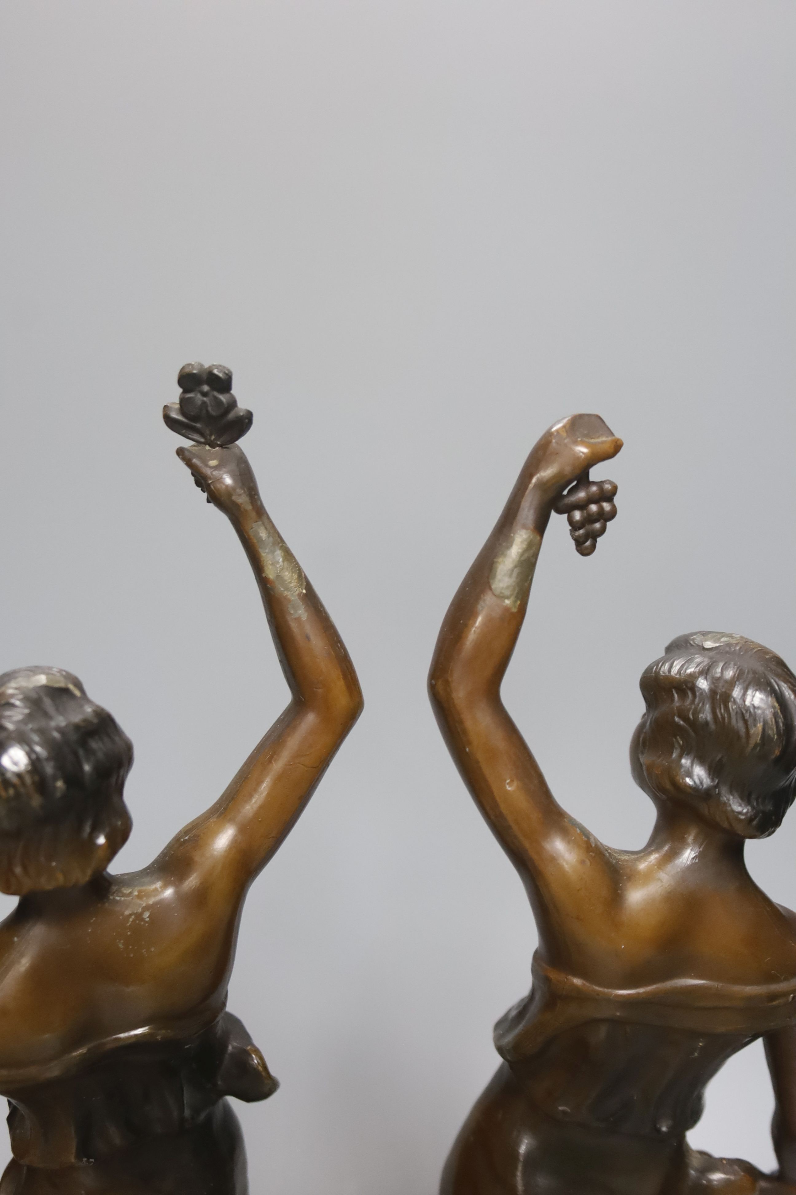 A pair of patinated spelter figures 37cm